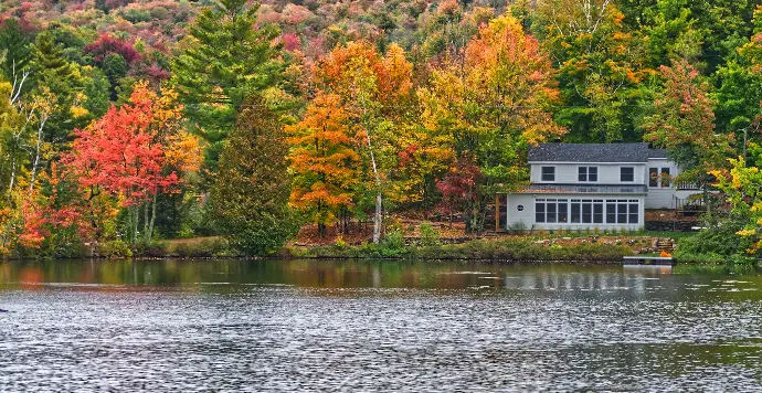 white building near body of water